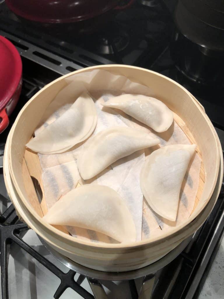 I put in 5 dumplings at a time. You don't want to over crowd the dumplings 
