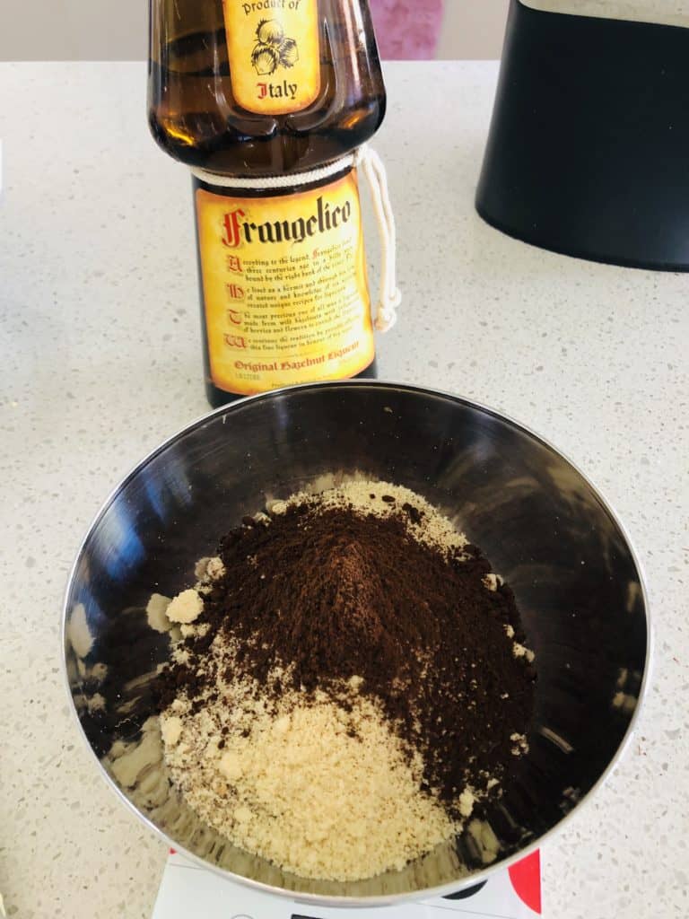 Hazelnut meal and ground coffee with some Frangelico liquor 