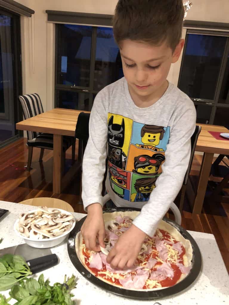 getting the kids involved to make traditional pizzas 